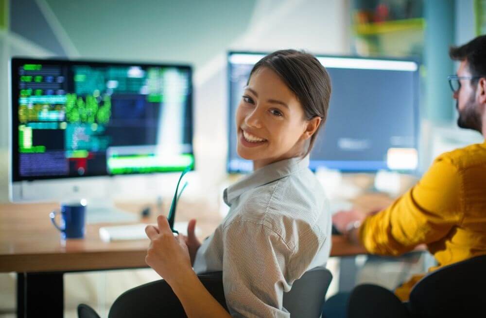 photo showing a smiling programmer
