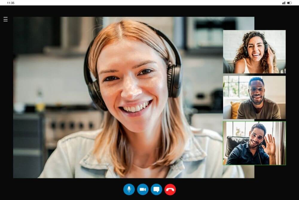 The screen shows a woman participating in an online meeting, with thumbnails of other participants to the right